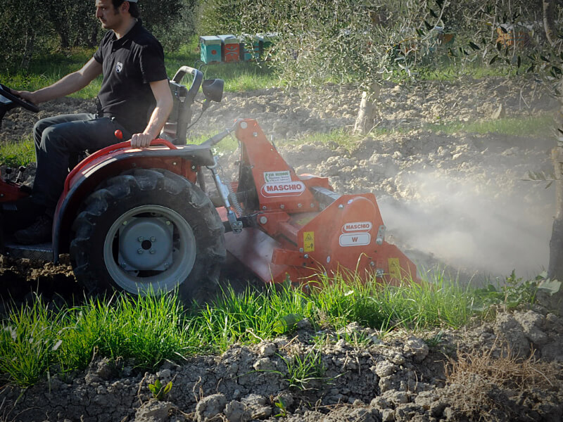 W - Rotary tiller with adjustable offset