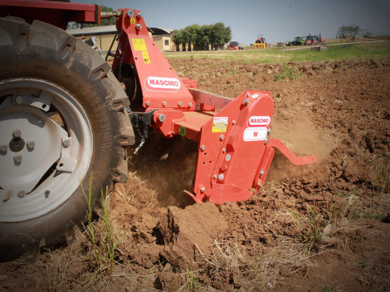 W - Rotary tiller with adjustable offset