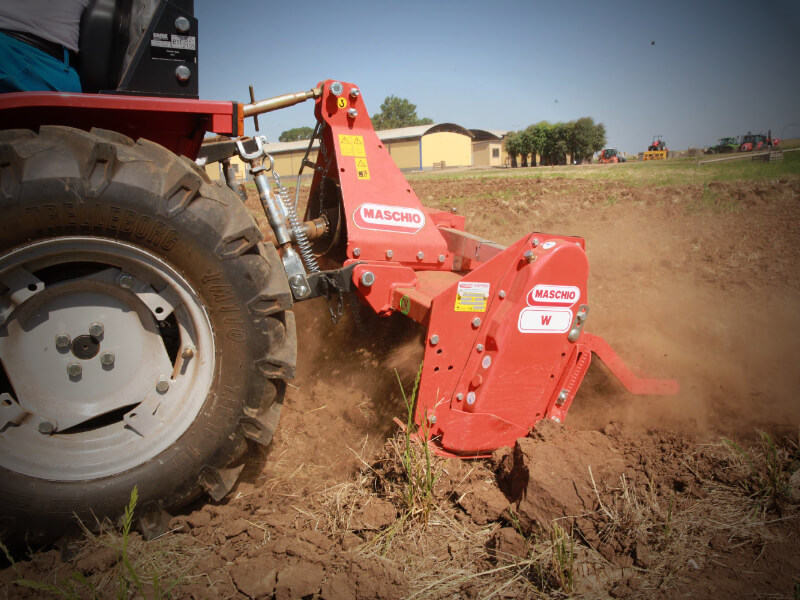 W - Rotary tiller with adjustable offset