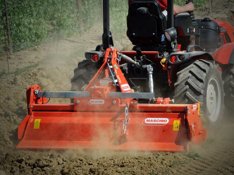 W - Rotary tiller with adjustable offset